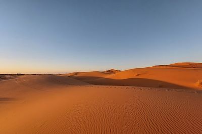 © Tawfiq Bedrane - Coucher de soleil sur les dunes de Merzouga - Maroc Coucher de soleil sur les dunes de Merzouga - Maroc